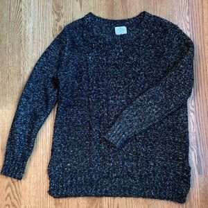 dark grey cable-knit sweater